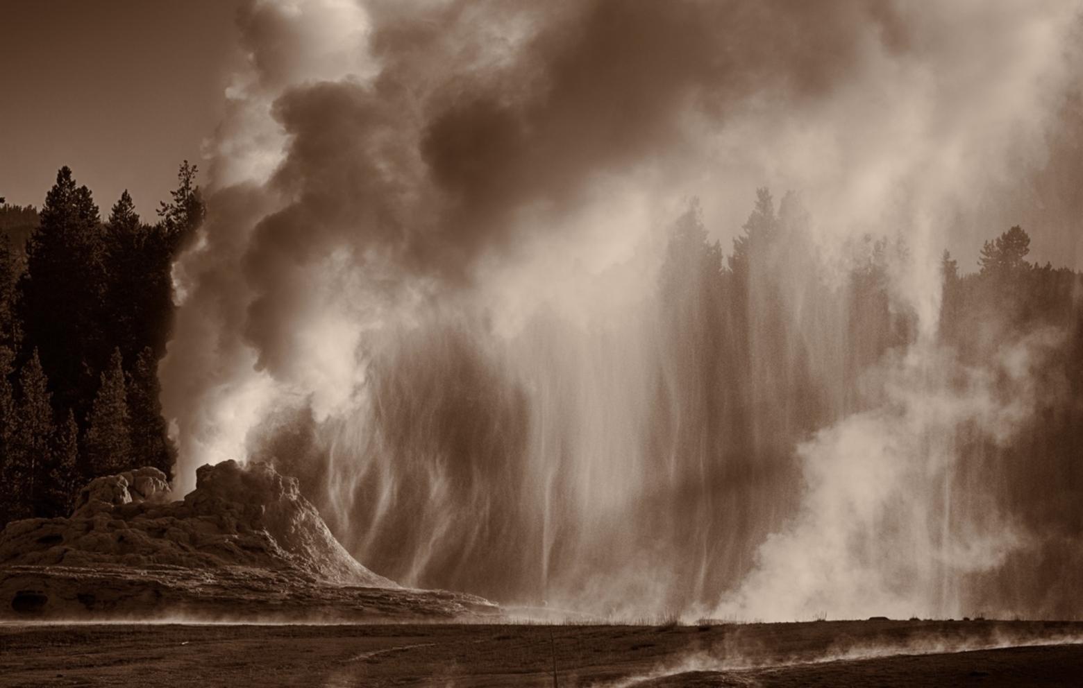 &quot;Castle Geyser geysering all over the place. — at Yellowstone National Park.&quot;