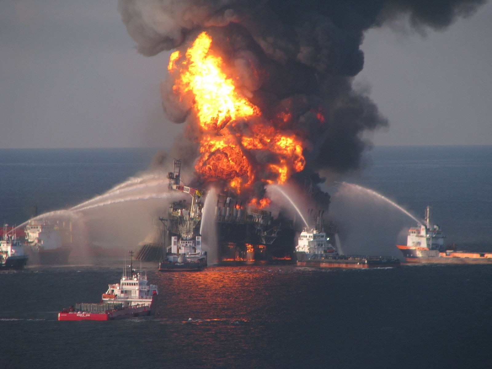 BP's Deepwater Horizon drilling platform disaster which started on April 10, 2010 and leaked  3.19 million barrels of oil into the Gulf of Mexico across 87 days,  caused $62 billion in damages and clean-up costs. It is by far the worst oil spill in U.S. history. Photo courtesy NOAA