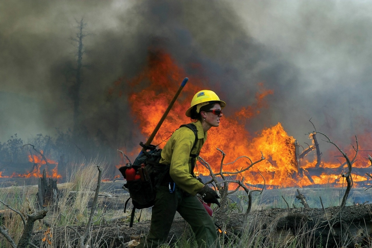 For women in U.S. land management and wildlife agencies, the struggle to be treated as equals has sometimes felt like marching into a wildfire. Photo courtesy Kristen Honig / NPS