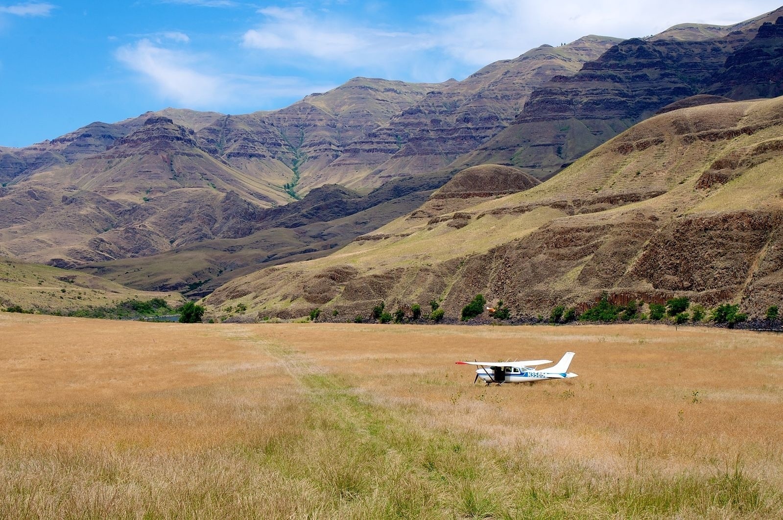 Federal wilderness areas have been spared remote airstrips like this one in Hells Canyon along the Lower Snake River in Oregon. Legislation moving through Congress would allow some wildlands to become landing strips, shattering the sense of mechanized-free isolation so rare in an ever-crowded world. Photo courtesy Sam Beebe/Ecotrust