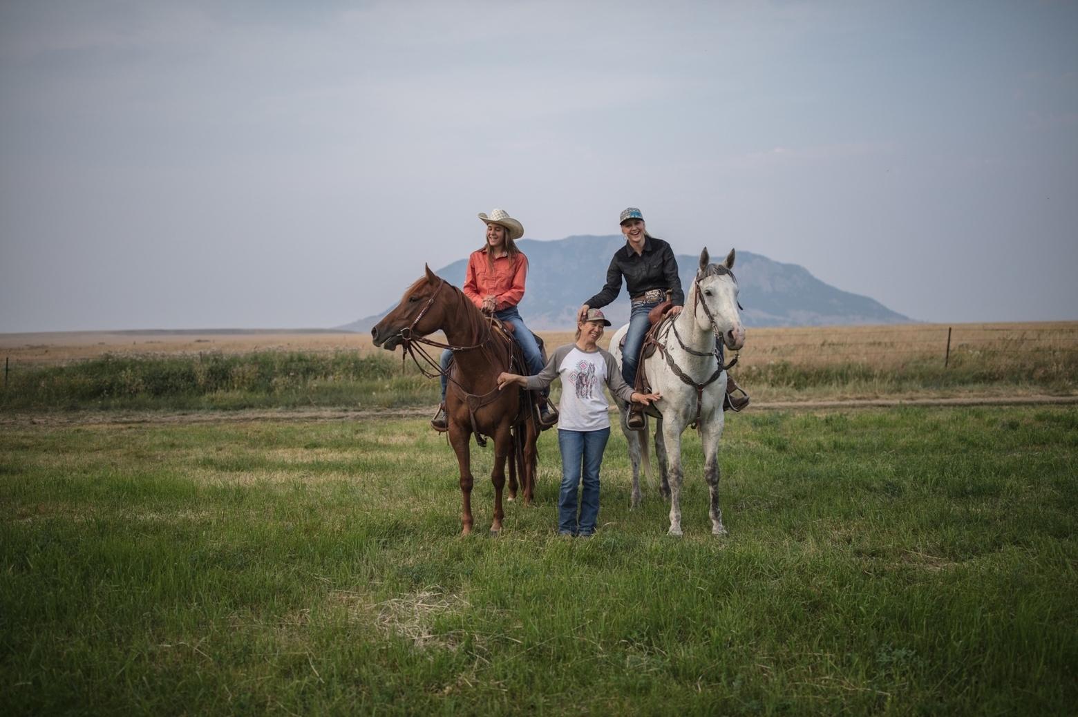 Irene and Sadie Johnson with their mother, Nicole, on their home ranch, the U-Cross near Roy, Montana. Nicole Johnson and her husband Lance have been on this ranch for 18 years where they have raised their girls.&nbsp; Photo by Louise Johns