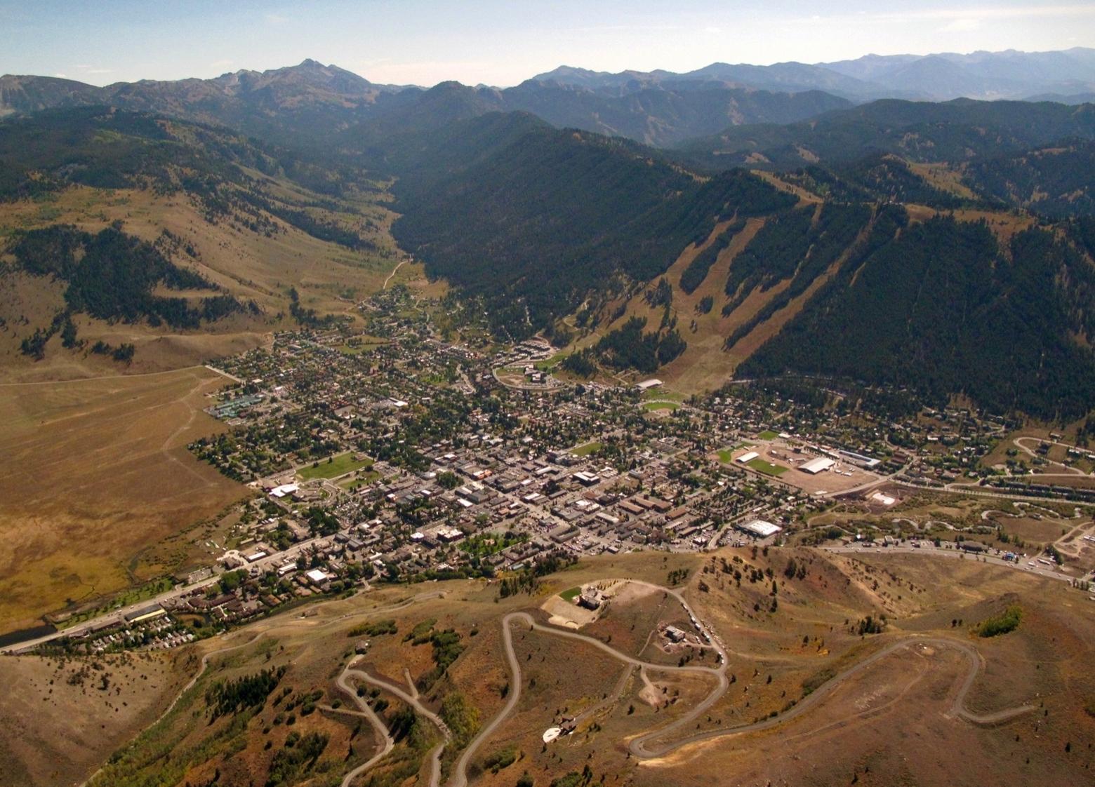 The town of Jackson, hub of Teton County, Wyoming and a busy hive of human activity, may look quaint from the sky.  However, the tentacles of its tourist-driven economy extend in every direction. Even though 97 percent of Teton County is comprised of public land, intense development pressure on private land has exerted direct impacts on wildlife and community character. A more insidious force is outdoor recreation putting more intense pressure on public lands. While the consequences of that have left many in denial, there is rising social angst over whether the wild essence of the valley can survive, observers say.  Photo courtesy EcoFlight (http://ecoflight.org)