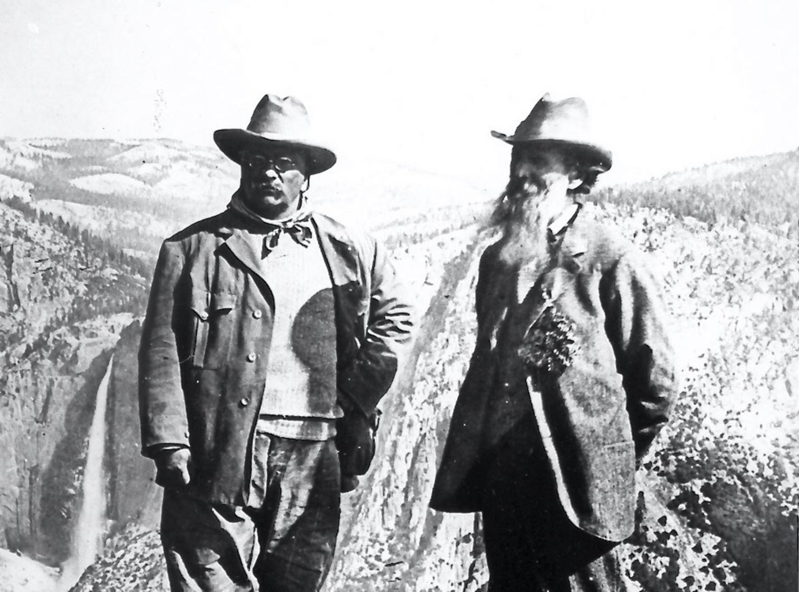 Theodore Roosevelt, left, and John Muir at Glacier Point in Yosemite, 1903. The same year he made a trip to Yellowstone and set down the cornerstone of what is today the Roosevelt Arch at the park's north entrance. During the Yellowstone trip, he shared company with naturalist and essayist John Burroughs. Photo courtesy NPS