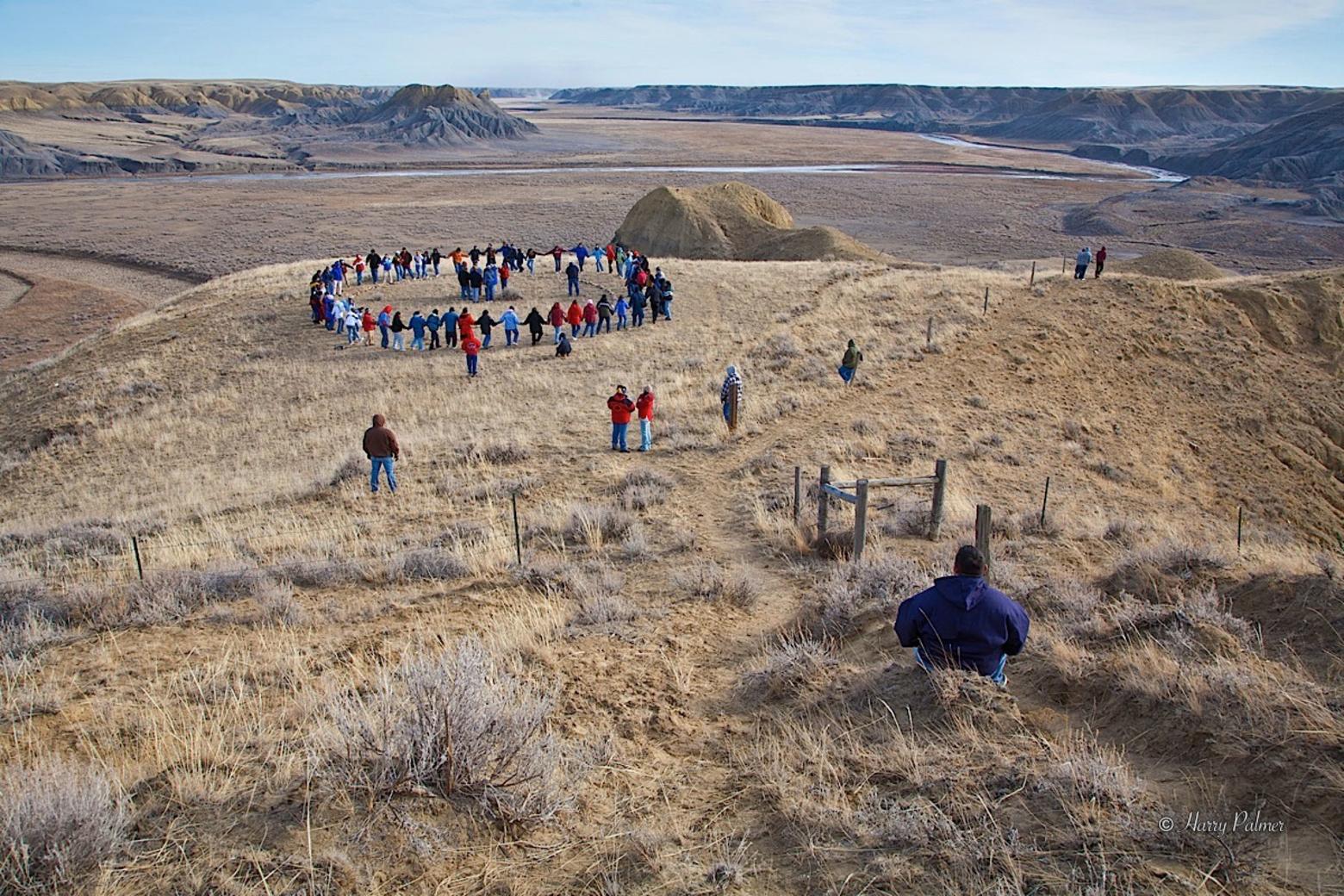 In 2006, members of the Blackfeet Confederacy gather for a round dance at the site of the 1870 Marias Massacre along the Marias River.  Photo courtesy Harry Palmer, licensed via Creative Commons NonCommerical-NoDerivs 3.0.  To see more Harry Palmer's work go to www.aportraitofcanada.ca 