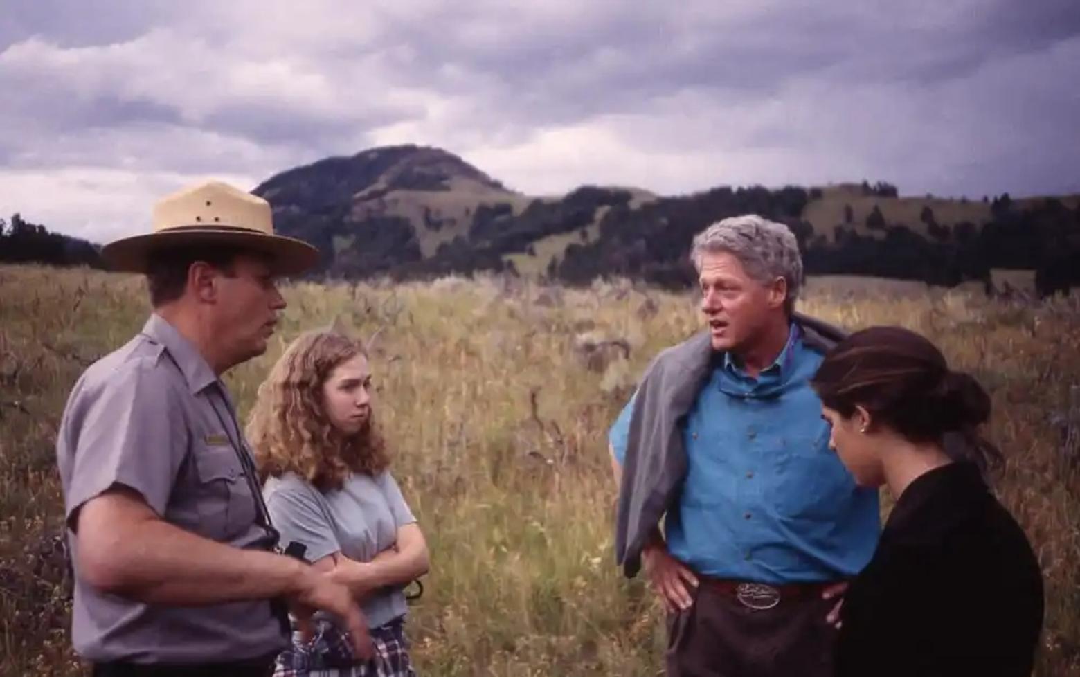 Finley briefs Bill Clinton and his daughter Chelsea during a visit to Yellowstone when Clinton was in office. Photo courtesy NPS