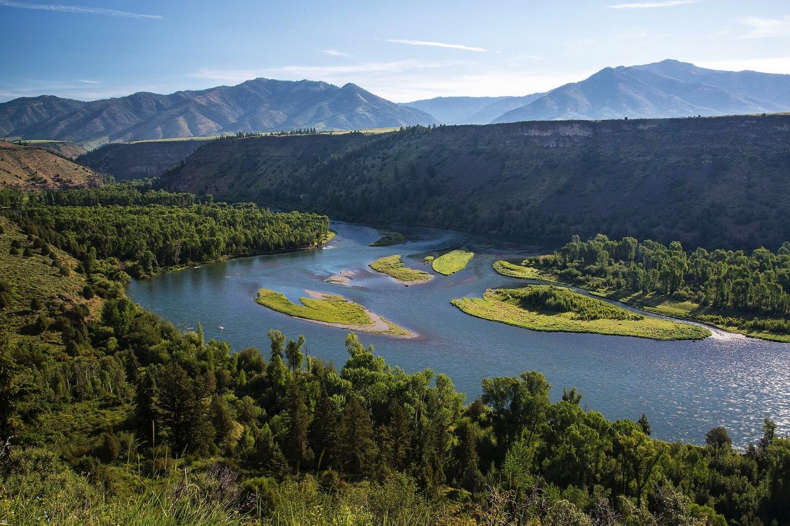 The South Fork of the Snake River in Idaho managed by the BLM. Imagine if, instead of it being protected, this popular stretch was lined by trophy homes and/or turned into a water park.  As Newcomb notes, unimpaired places always demonstrate their higher intangible value over time. And once they are gone you can't get them back.  Photo courtesy Bureau of Land Management.