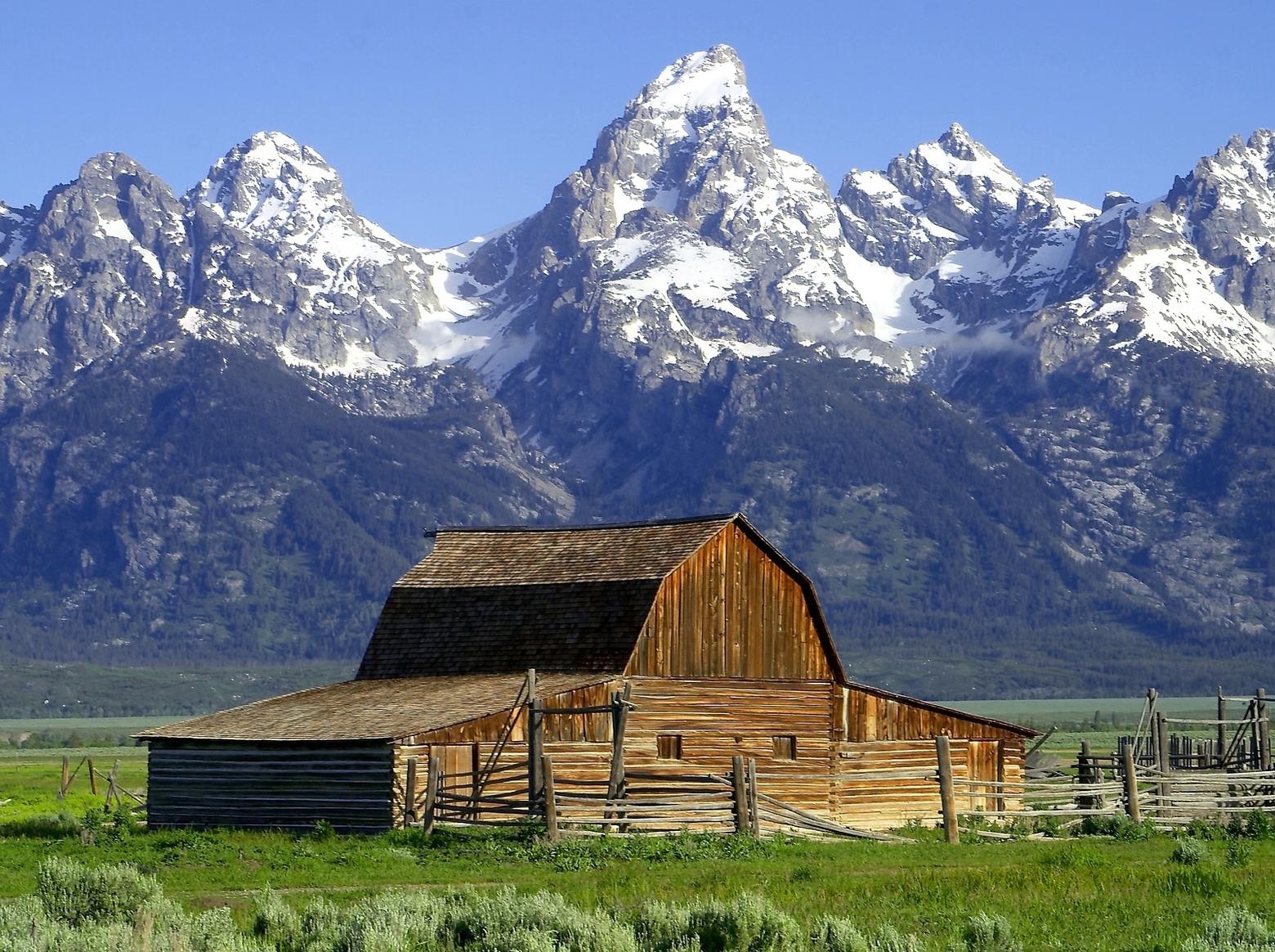 Moulton Barn fronts the Tetons in Grand Teton National Park. Protected lands, wildlife and a healthy environment have fueled Teton County becoming one of the richest counties in America.  A national park that started as a national monument, Grand Teton is a bold example of  the long-term dividends of conservation as opposed to the short-term whims of boom and bust. 