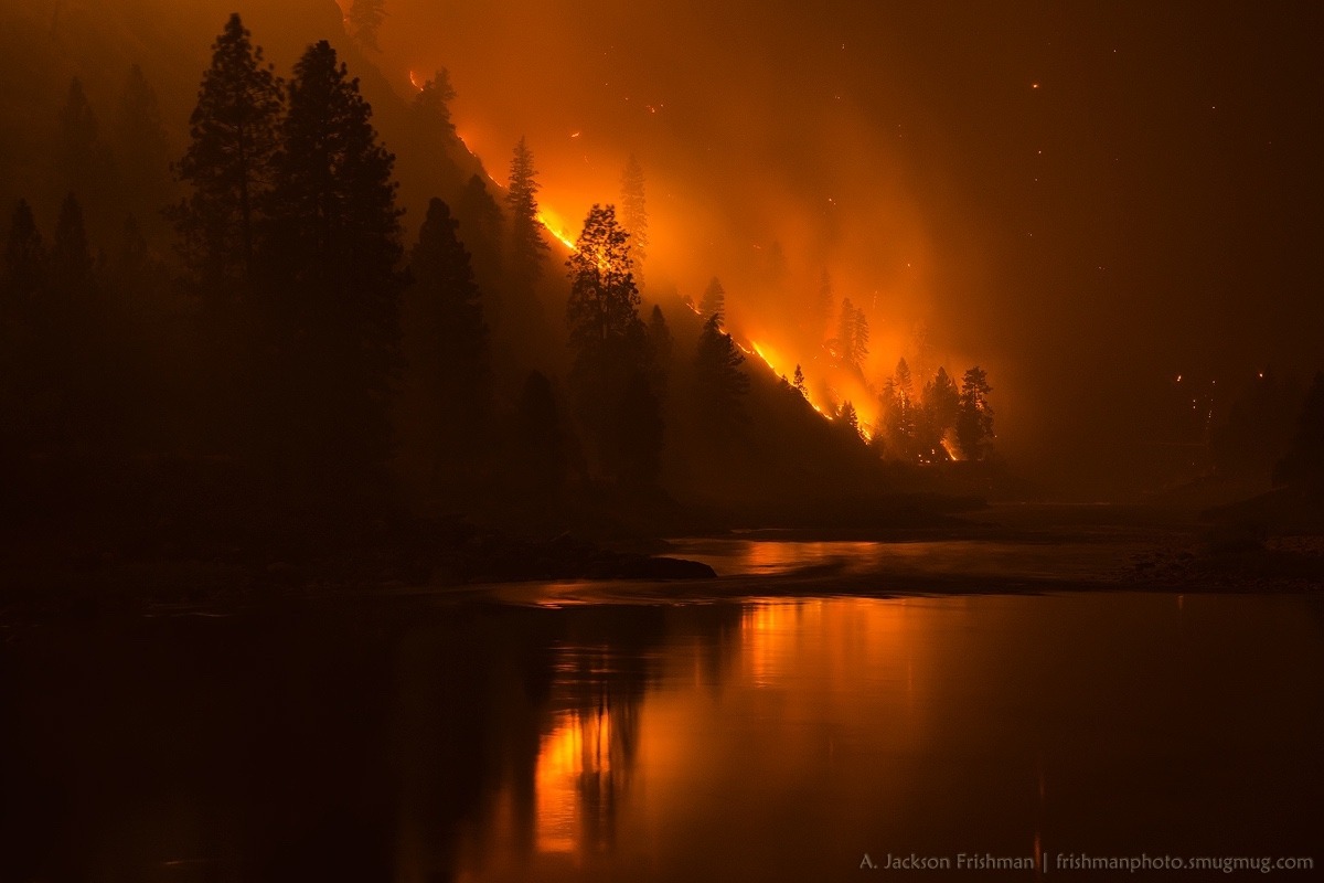 Tepee Springs fire of 2015 reflected in the Salmon River, Idaho. Photo by Jackson Frishman