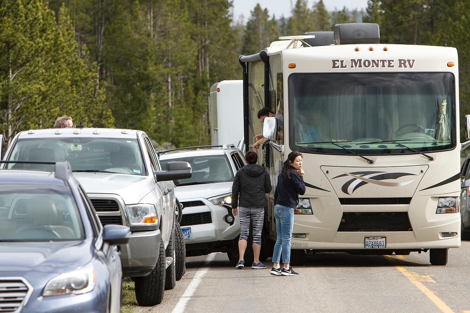 In summer, Yellowstone's frontcountry is bursting at the seams with people, already exceeding the carrying capacity which marks the difference between a pleasant vacation in nature and a harried one.  Critics of Zinke's "Made in America" committee say it is all about promoting expanded use of public lands to help members of the outdoor industry sell more product without seriously pondering the necessity of limits.  Photo courtesy Jim Peaco/National Park Service