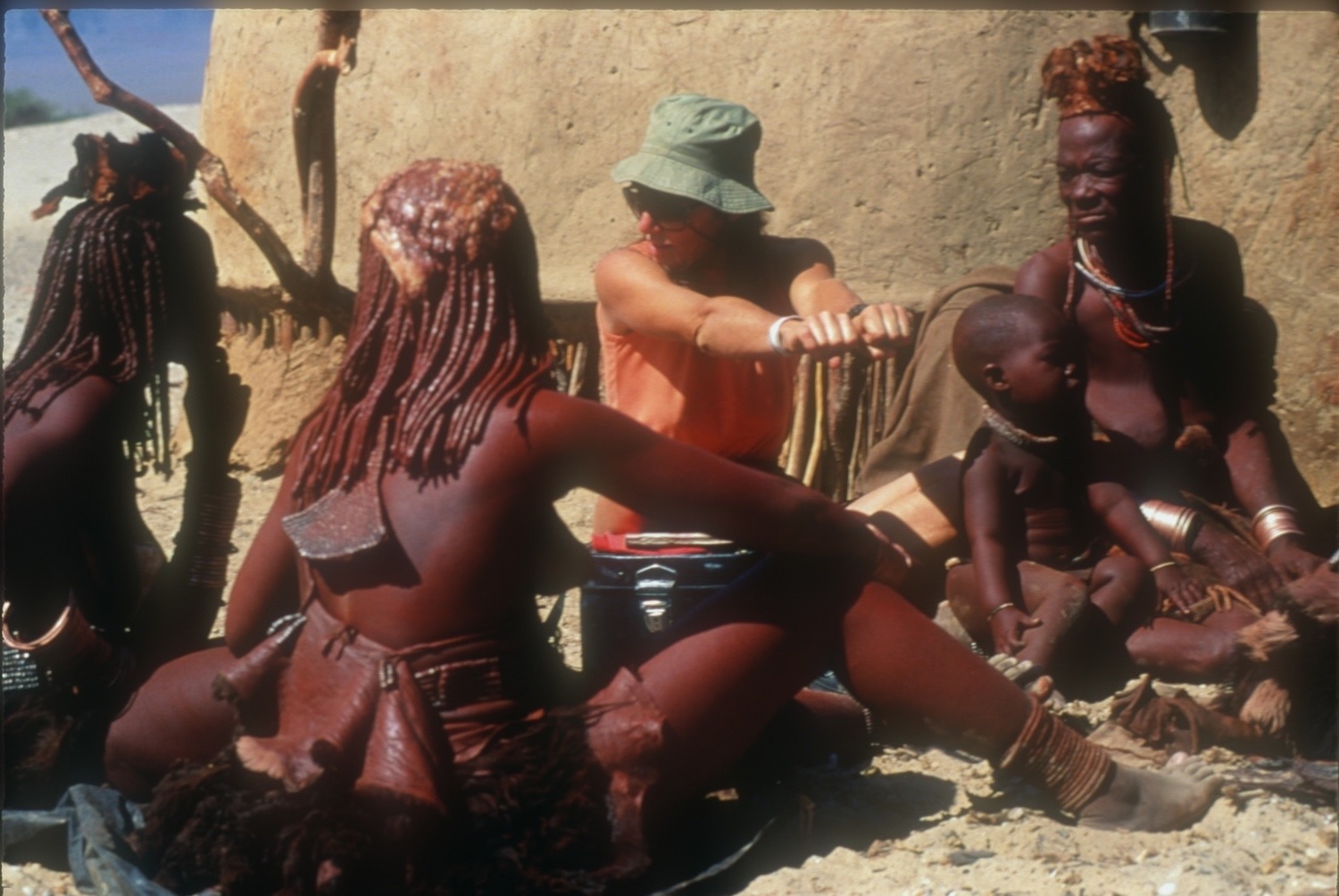 Dr. Margaret Jacobson in the Namibian village of Purros with her Himba friends, 1989. Photo courtesy Steven Fuller