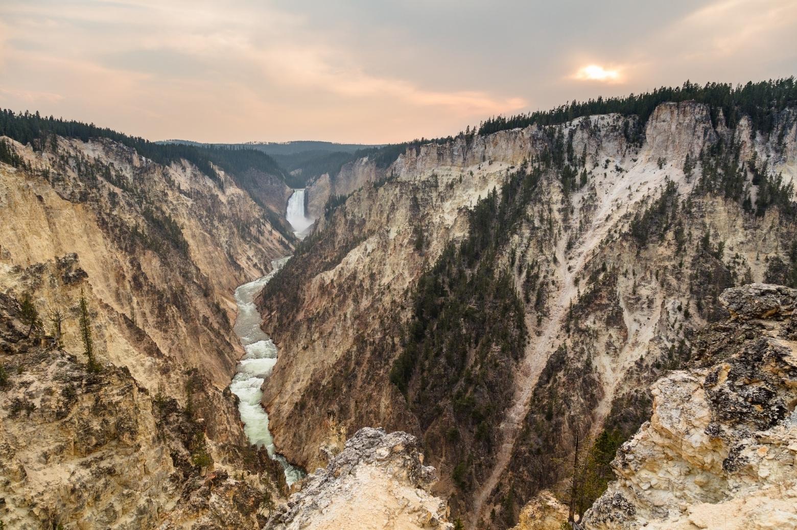 Grand Canyon of the Yellowstone at sunset from Artist's Point. As wild and rugged as Greater Yellowstone is, the region is fragile and facing unprecedented pressure from human development, recreation and the big one, climate change. Photo courtesy Jacob W. Frank/NPS