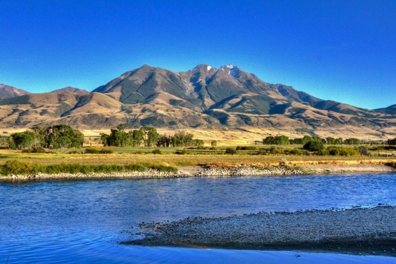 Emigrant Peak rising above the Yellowstone River in Paradise Valley, Montana. A Canadian mining company wants to open a new hard rock mine at the foot of the mountain but, responding to a broad coalition of public opposition, Interior Secretary Ryan Zinke imposed a 20-year ban.  Photo courtesy Wikimedia