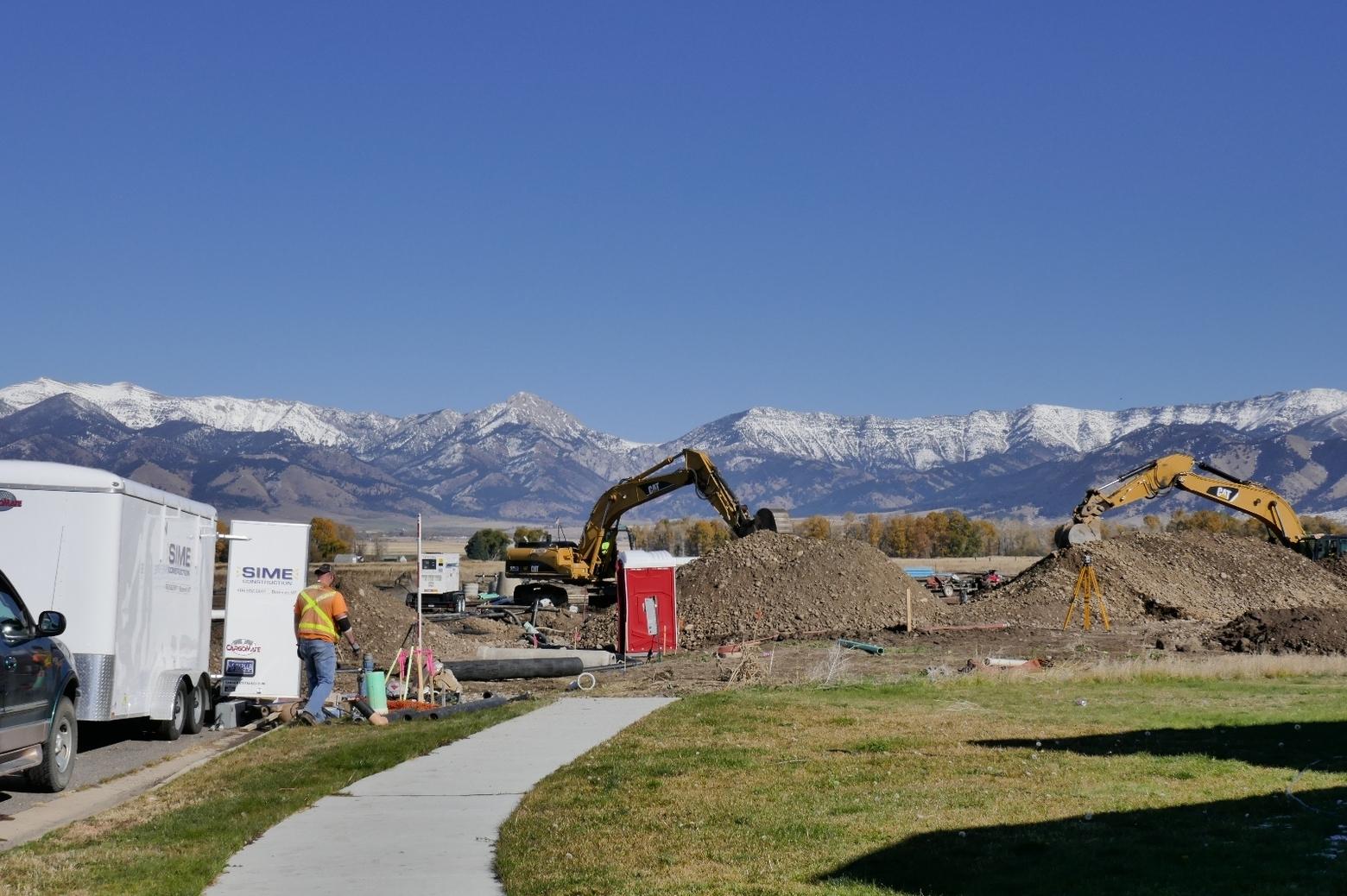 New subdivisions have created greater demand for services, including larger police and fire departments, new schools, and infrastructive that is costly to build and brings with it accumulating burdens to maintain.  Columnist Crawford asks, "where is the sidewalk of growth leading us?"  Photo by Tim Crawford