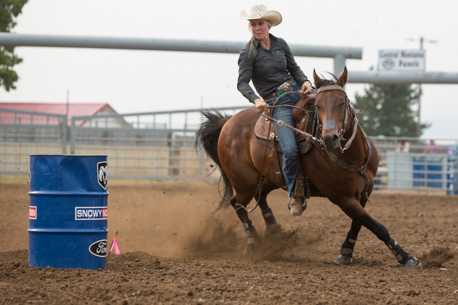 Sadie Johnson competes in a barrel racing event on her horse, Rocket, at the Lewistown Rodeo in August 2018, part of the Montana High School Rodeo Association. Sadie has been competing since 8th grade. Photo by Louise Johns