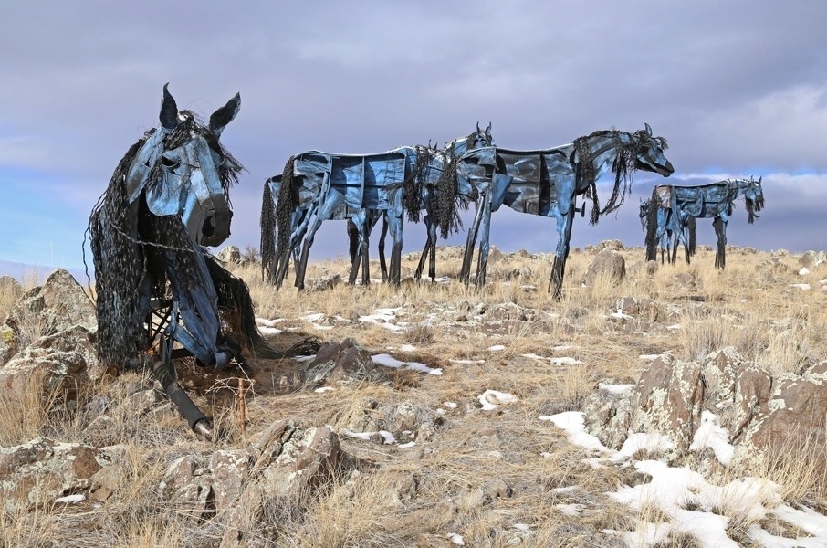 Jim Dolan's &quot;Bleu Horses&quot; are something of a landmark, inhabiting a bench of land north of Three Forks along US Highway 287.  They've served as inspirations to Gurnett and Dolan himself a mentor.  Photo courtesy Jim Dolan