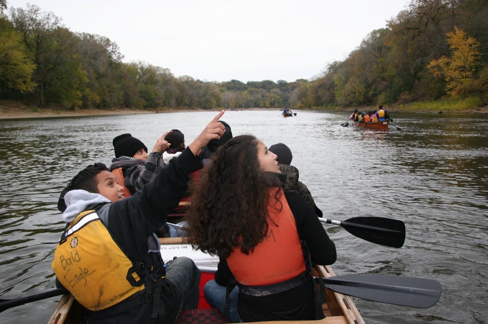 You don't have to travel to Yellowstone to discover a love of nature, feel empathy for wildlife and become sympathetic for protecting the natural world.  The connections that last a lifetime start early and close to home. Here, kids float the Mighty Mississippi amassing a wildlife checklist. Photo courtesy National Park Service