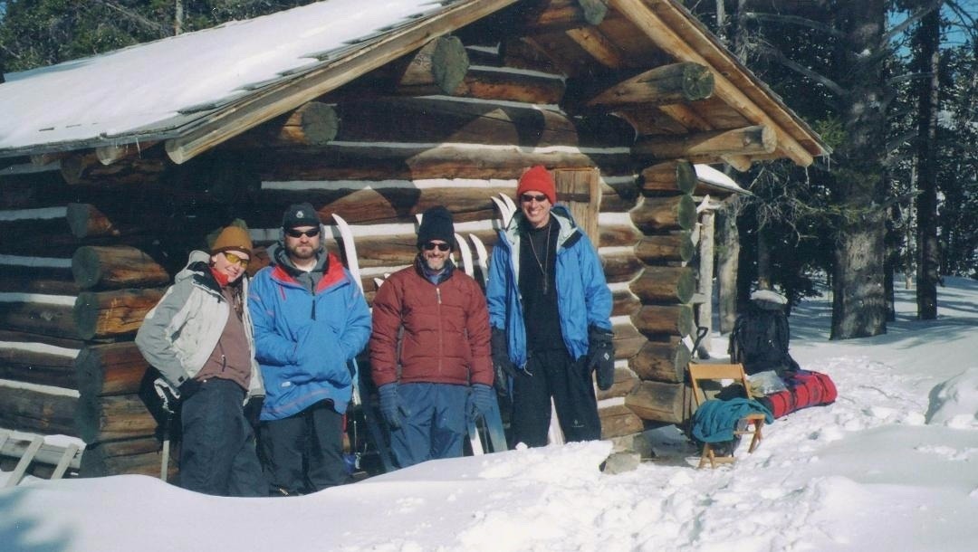 In 2006, Yochim, second from right, skiied with friends into the Yellowstone backcountry and are pictured here having lucnh at hte Pelican Springs Cabin. Joining Yochim were Stacey and Kerry Gunther (Yellowstone's chief grizzly bear biologist) and Steve Swanke, far right. Photo courtesy Michael Yochim