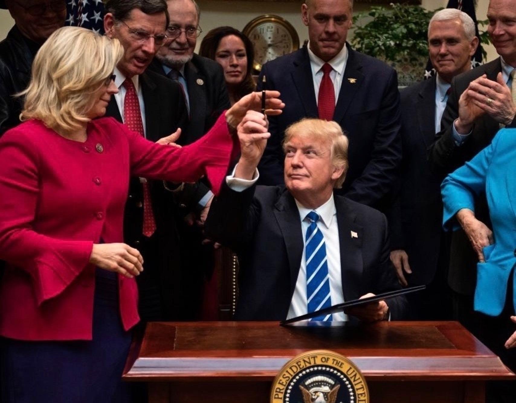 President Trump gave Congresswoman Liz Cheney a pen after he signed an executive order removing regulations pertaining to coal and proclaimed that he would revive the coal industry in America. That hasn't happened—the coal market is plunging due to a glut of natural gas. Both the President and U.S. Rep. Cheney claim that human-caused climate change is based on "junk science" but they've provided no evidence, capable of withstanding scrutiny, to back it up.  Photo courtesy The White House