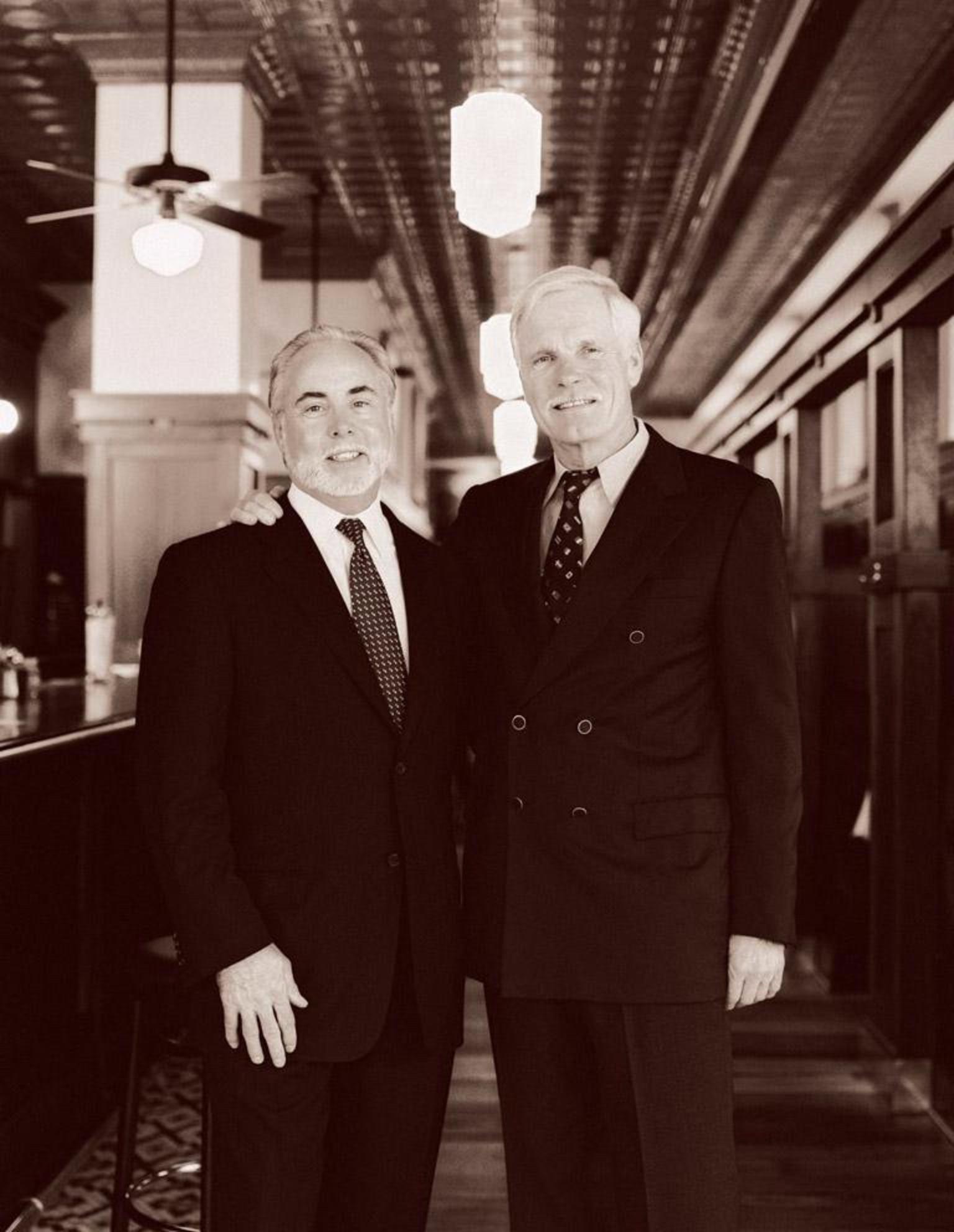 George McKerrow, left, with Ted Turner, at the Ted's Montana Grill restaurant located at the Turner Building in downtown Atlanta. Photo courtesy Ted's Montana Grill