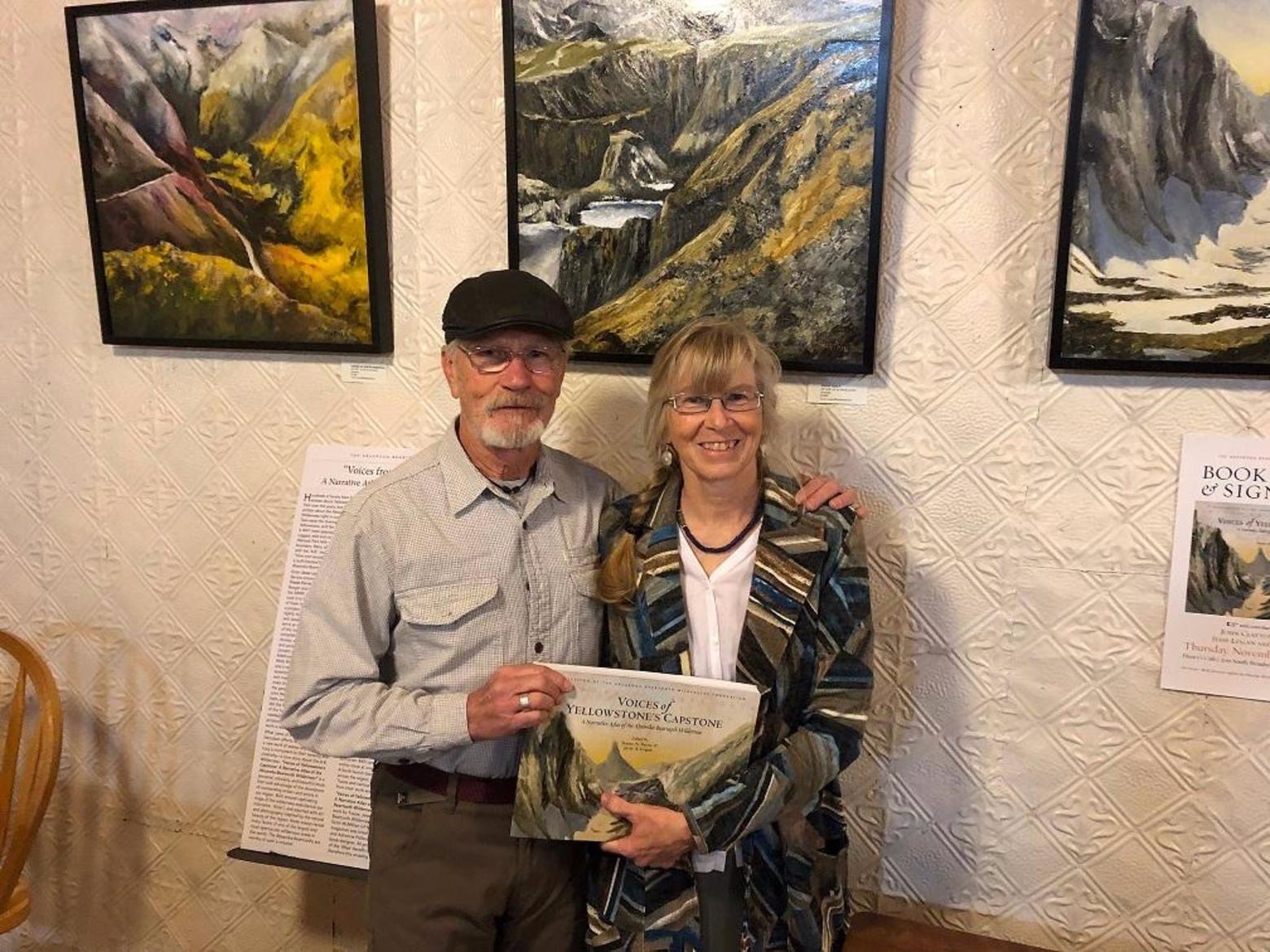 Before a standing-only crowd, Jesse Logan and Traute Parrie hold their labor and love and momentous literary contribution celebrating one of America's most heralded wildlands.  Photo courtesy Don Carroll