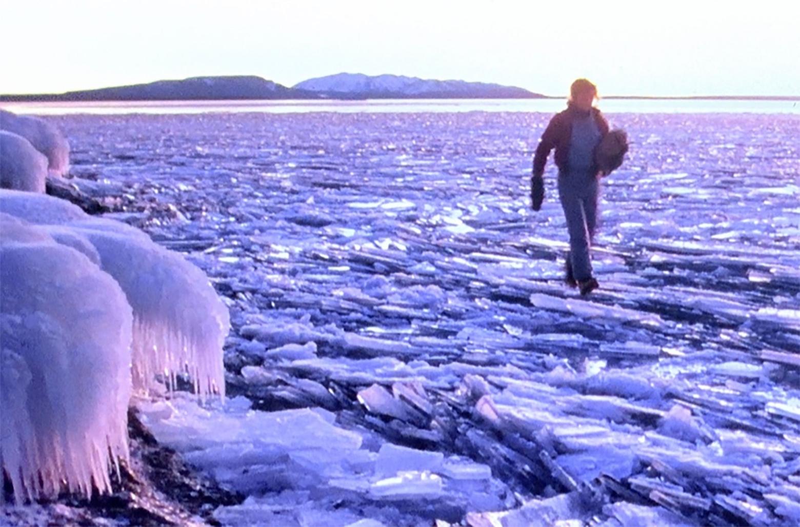 A Fuller family member strolls across shattered lake ice, as sharp as glass, on Yellowstone Lake. Photo courtesy Steven Fuller