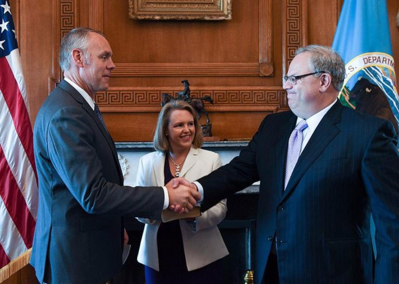 Prior to his resignation as Interior Secretary, Ryan Zinke welcomes David Bernhardt aboard to serve as his top undersecretary.  Months later, Zinke resigned his cabinet-level position amid several ongoing ethics investigations. President Trump chose Bernhardt to be Zinke's replacement.  Photo courtesy US Department of the Interior.