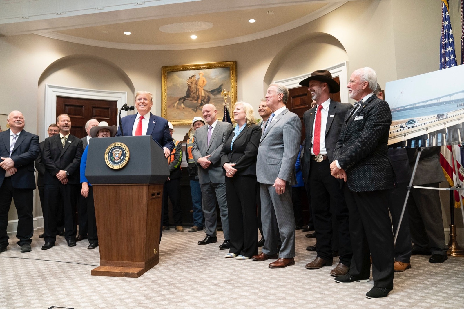 President Trump, flanked by cabinet members and leaders of industry, announced sweeping changes to the National Environmental Policy Act in early January 2020 in the Roosevelt Room of the White House. In the background is a portrait of Theodore Roosevelt, America's first conservationist President.
