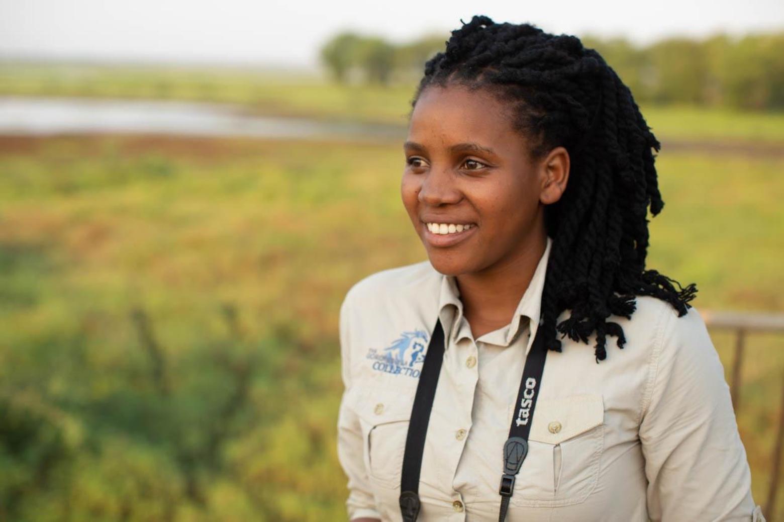 The author, Gaby Curtiz, at home in the national park she's helping to protect for generations to come by serving as a role model and using education (for local people and global visitors) to be the foundation for co-existence between healthy landscapes and communities.  Photograph courtesy Brett Kuxhausen (brettkuxhausen.com)