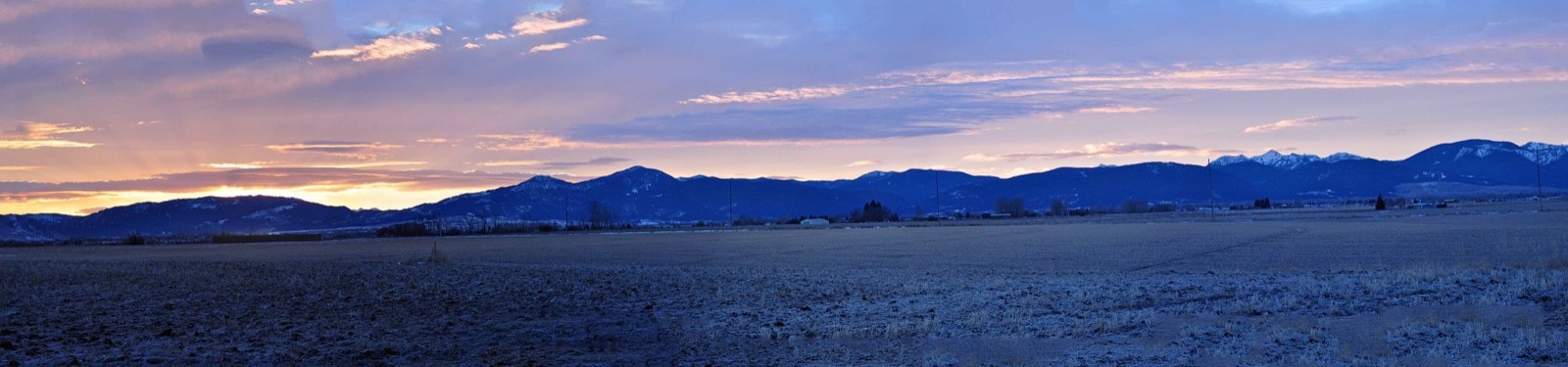 Sunrise comes to Bozeman and the rapidly growing Gallatin Valley with the Gallatin Mountains rising in the distance south of one of America's fastest-growing micropolitan cities.  Photo courtesy Mike Cline/Wikipedia/https://creativecommons.org/licenses/by-sa/4.0