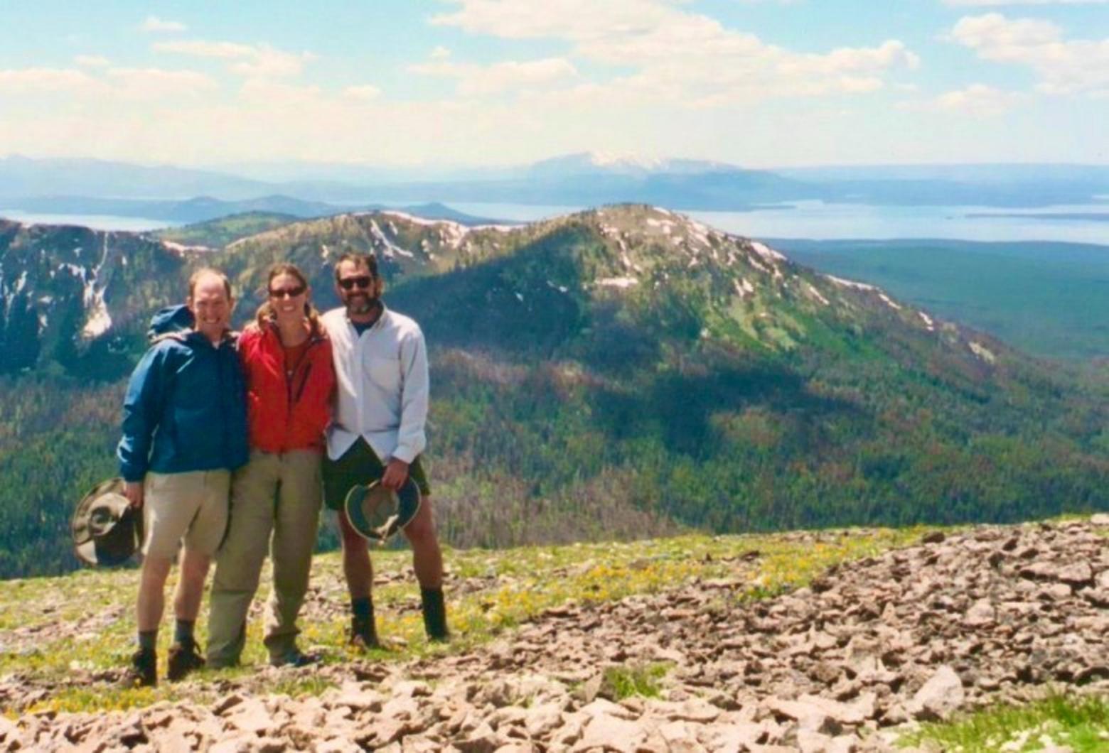 Yochim and family in healthier times on Avalanche Peak with Yellowstone Lake in the distance below. Photo courtesy Brian and Jill Yochim
