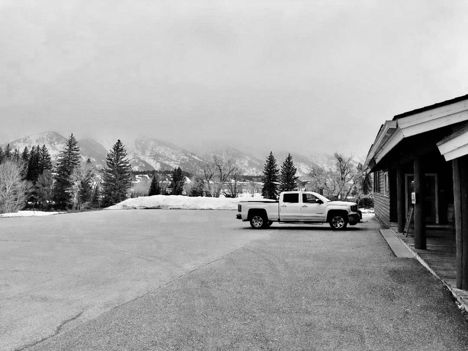 Backdropped by the Tetons, the restaurant-saloon, chuckwagon, general store and canoe rental complex known as Dornan's is a popular place that most of the millions of visitors to Grand Teton pass by every year. But it's now hauntingly quiet and like the iconic peaks obscured by inclement spring weather the outlook for the Jackson Hole economy is dreary and uncertain. Photo courtesy Huntley Dornan. 