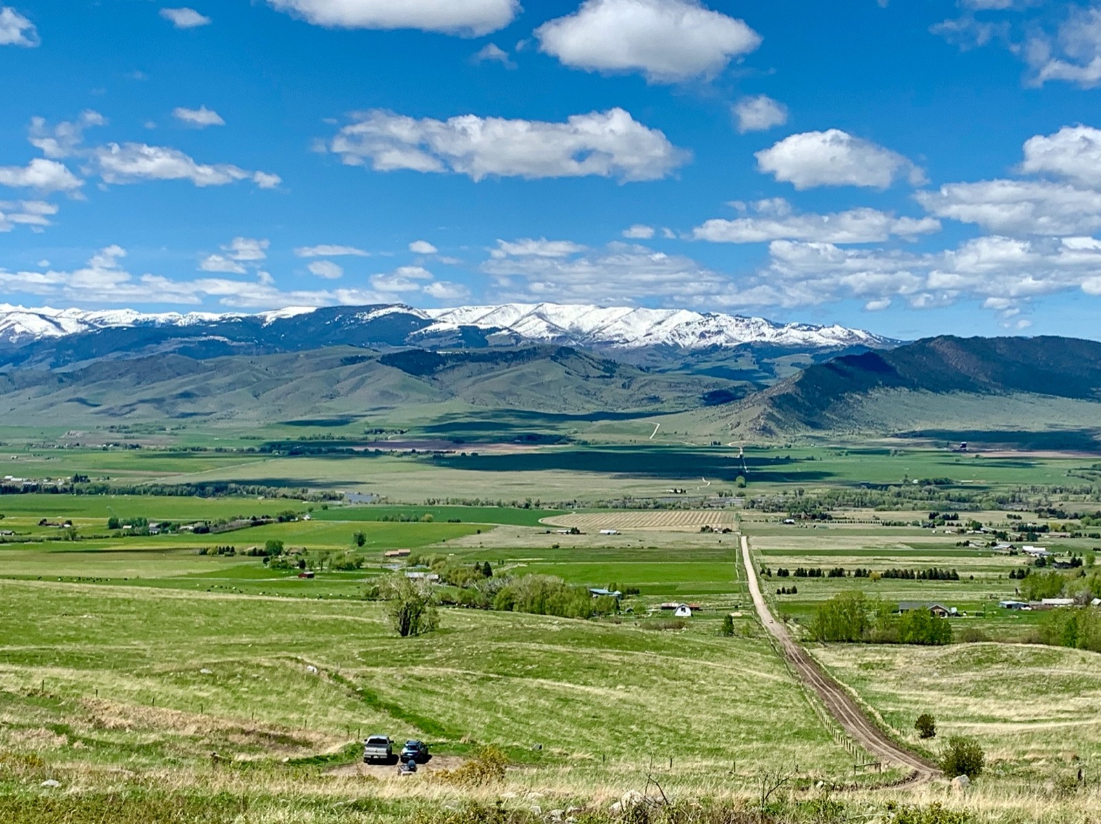 With its snow-covered ridgeline in the distance, the Gallatin Range rises above the western side of Paradise Valley and extends from the backyards of Bozeman and Livingston southward into Yellowstone National Park. As human impacts and presence grow on the other side of the Gallatins in Big Sky and as Paradise Valley fills in with more people and climate change brings hotter and drier conditions, the Gallatins will become even more important as a place of refuge for wildlife, scientists say. Photo by Todd Wilkinson