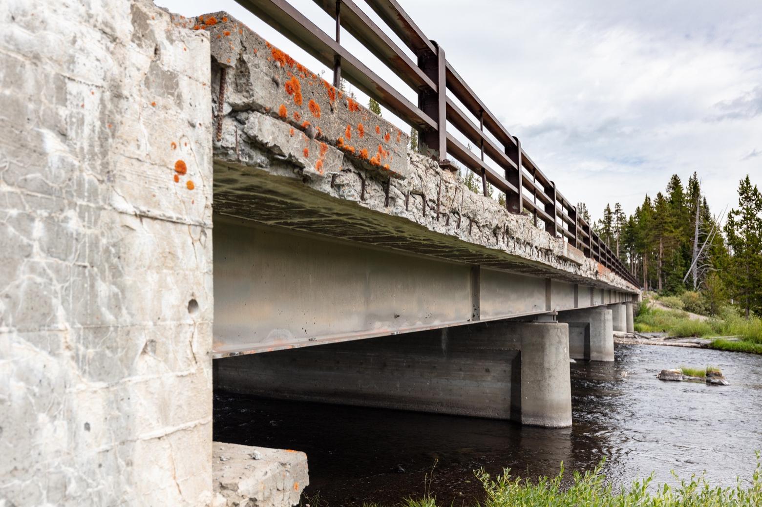 The Lewis River Bridge in the southern part of Yellowstone shows the need for repair after years of inadequate funding preventing park managers from having the resources they neede to address infrasture needs. The Great American Outdoor Act provides a mechanism for helping national parks coast to coast. Photo courtesy Jacob W. Frank/NPS