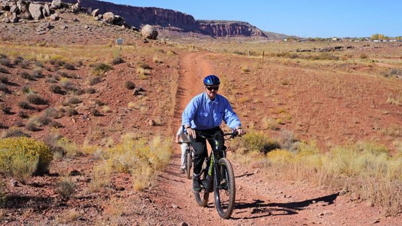 The BLM's "Acting" Director William Perry Pendley rides an e-bike on the outskirts of Moab, Utah.  Photo courtesy Eric Coulter/BLM