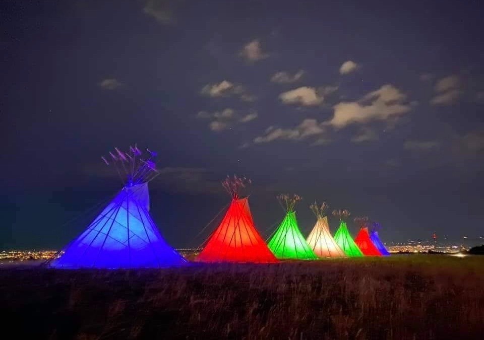 Seven Teepees set up in the night to honor those who have passed on and shared their stories. Photo by Jade Snell. To see more of Jade's work go to gurushots.com/jade.snell/photos