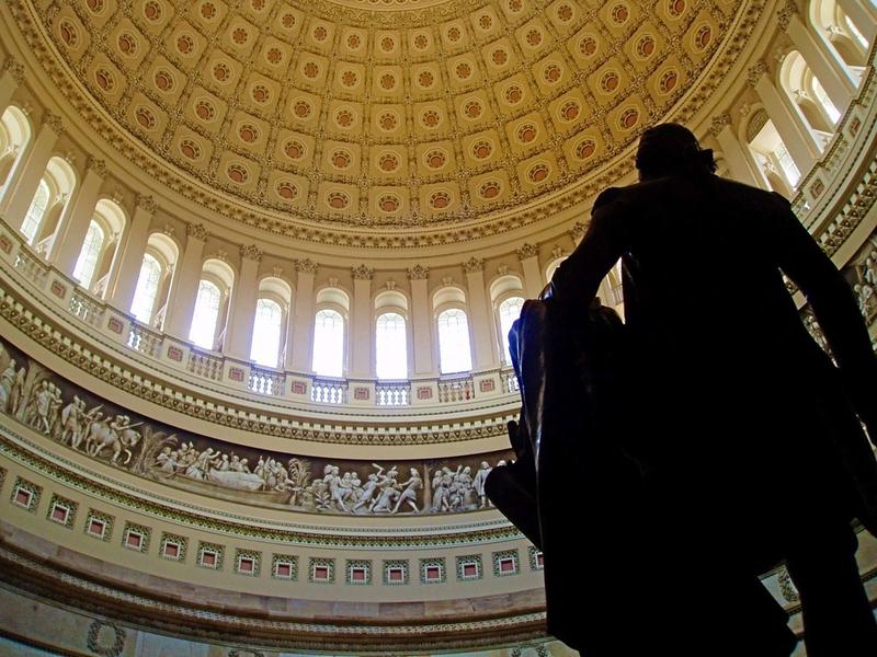 Washington in statue looks at the Rotunda dome