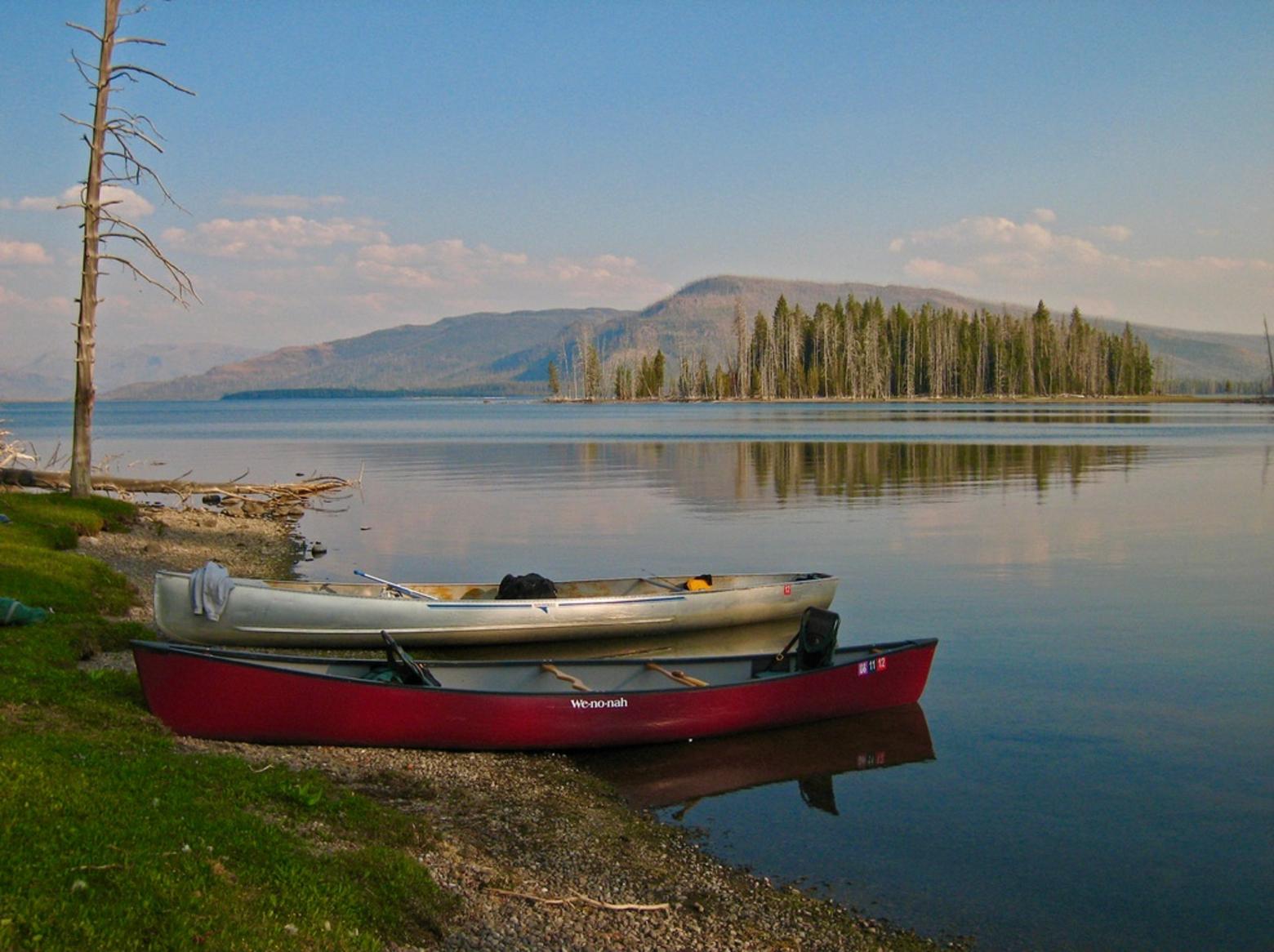 The southeast arm of Yellowstone Lake, one of the most remote wilderness corners of Yellowstone, is a place where motor boats are not allowed. Is it also a place that needs good cell phone reception?  Photo courtesy Jim Peaco/NPS