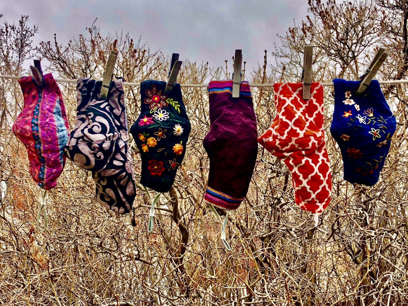 A string of washed and air-drying covid masks in southwest Montana are emblems of what the last year has brought—sorrow, fear, stress, anxiety, stir-craziness, fatigue and a way of adaptation that few probably ever thought possible on a mass scale. Photo courtesy Heidi Barrett