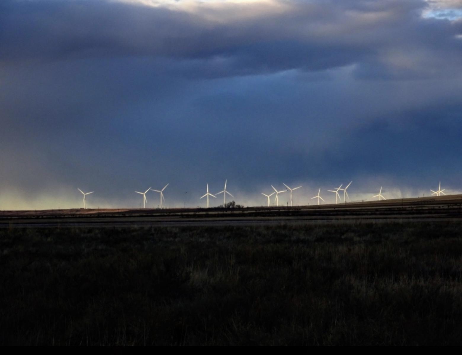 The Montana Climate Solutions Plan details actions Montanans can take to fight climate change, including increasing the state's sources of renewable energy. Here, wind turbines spin near Fairfield. Photo courtesy Scott Bischke