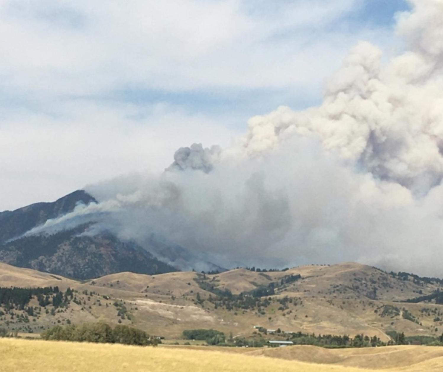 The Climate Change Human Health in Montana report, which came out earlier this year, describes the health hazards—both physical and mental—of smoke and particulate matter to Montanans. Here, the 2020 Bridger Foothills Fire that erupted Labor Day weekend near Bozeman. The blaze faced across the Bridgers and burned 68 structures, 30 of which were homes. Climate change already is increasing wildfire risk for people living in forested exurban areas also known as the wildland-urban interface across the West. Photo courtesy Bruce Maxwell.  