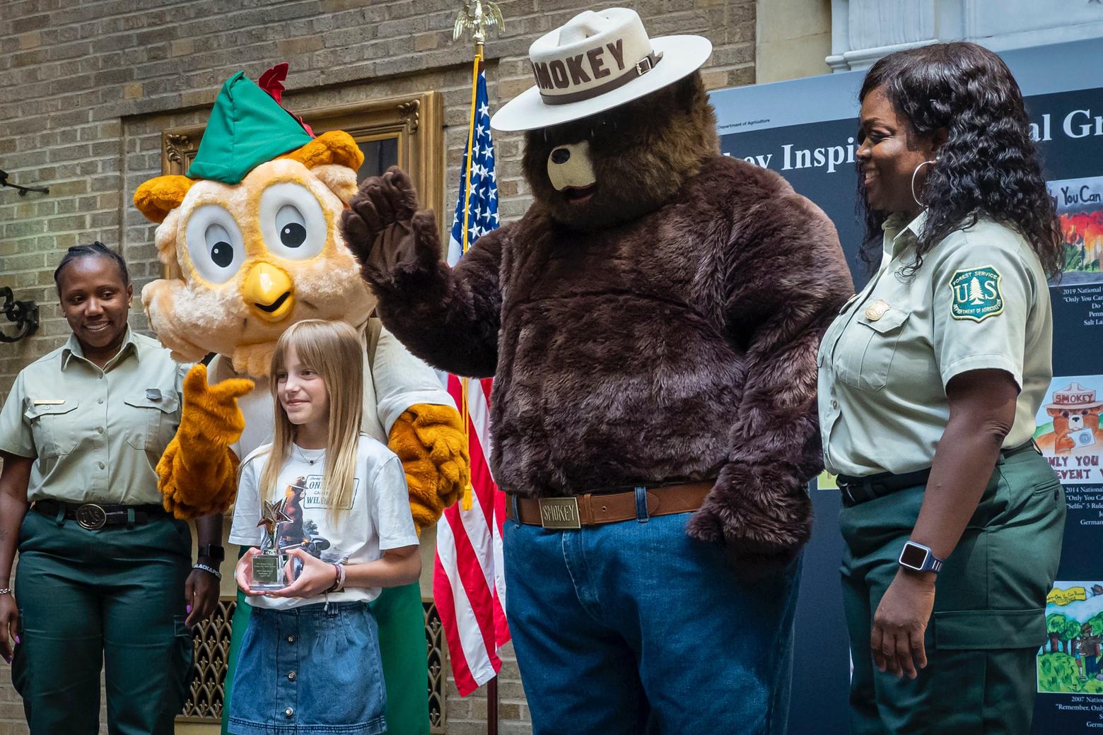 The Forest Service and other federal land management agencies say they are trying to be more inclusive in their hiring but what matters equally is the on-the-job atmosphere that awaits non-white employees when they arrive. This photo was taken as the 75th anniversary of Smokey the Bear's creation. Photo courtesy USDA Forest Service