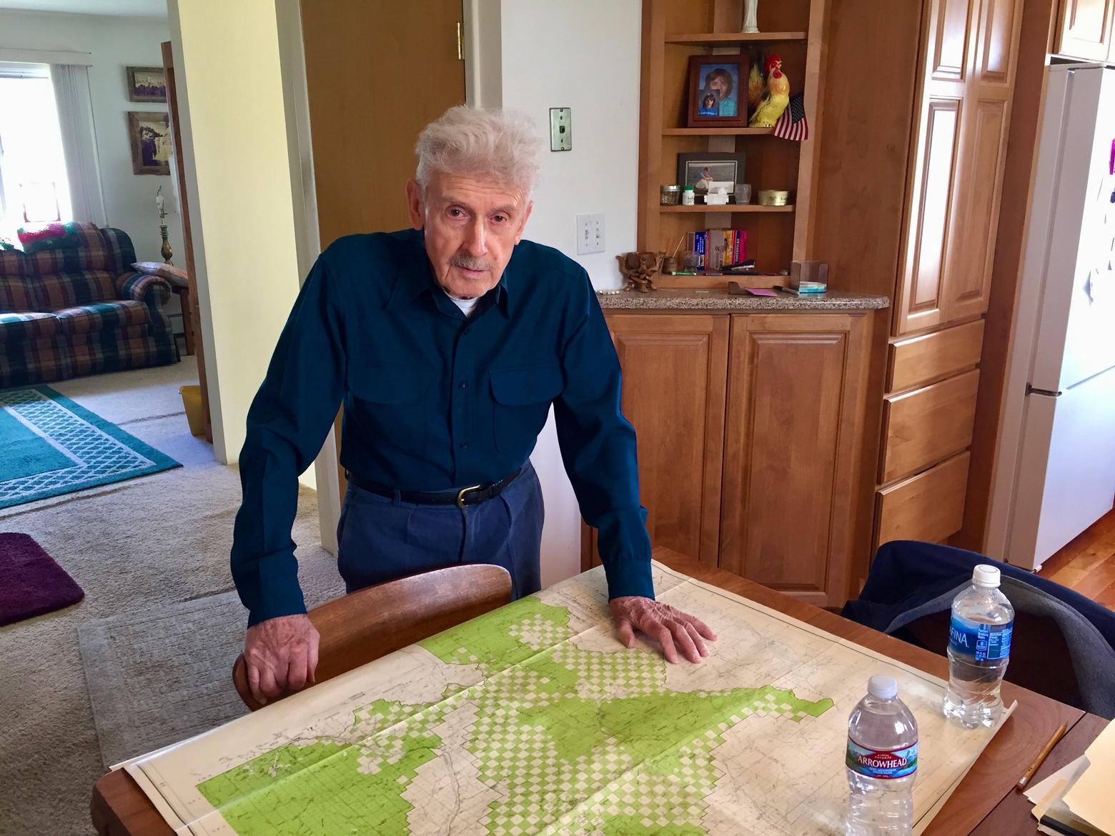 Gutkoski at home in his kitchen on the north side of Bozeman where he offered a cartographic overview of his wanderings in the Gallatin Range and the amount of acreage that he believed qualified for federal wilderness protection.  Photo by Todd Wilkinson