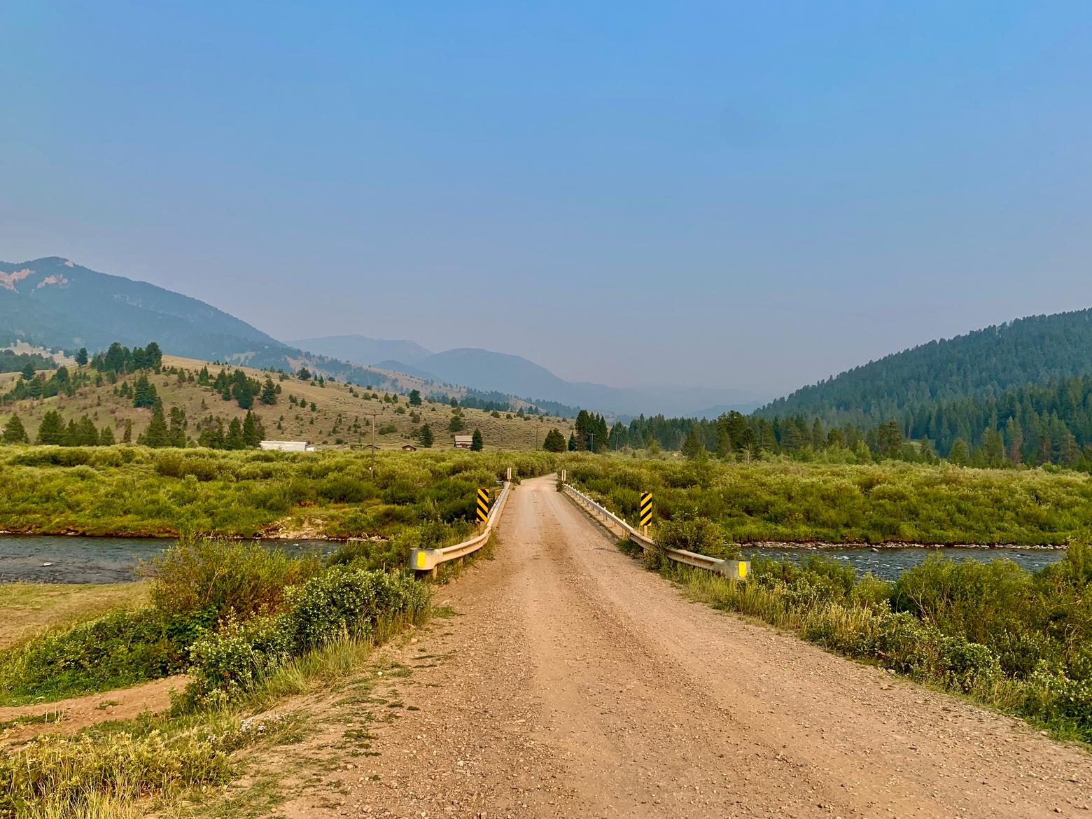 The dirt road passing over the Gallatin River south of Big Sky and gateway into the Porcupine Creek drainage, one of the most biologically-diverse corridors of the Gallatin Range. During the 1990s, developer Tim Blixseth parked a bulldozer in front of the Porcupine as a bold warning to conservation-minded citizens and the public—get him the land swap and cash he wanted for parcels he owned in the Porcupine or earthmoving equipment might roll. Gutkoski called out Blixseth's hardball maneuvering as crass and being out of step with Montana values. And he said conservationists need to be equally as vigilant in trying to protect areas like the Porcupine as those who want to exploit them for their own self-interests. "Wildlife can't advocate for itself. We need to give the animals a stronger voice," he said. Photo by Todd Wilkinson