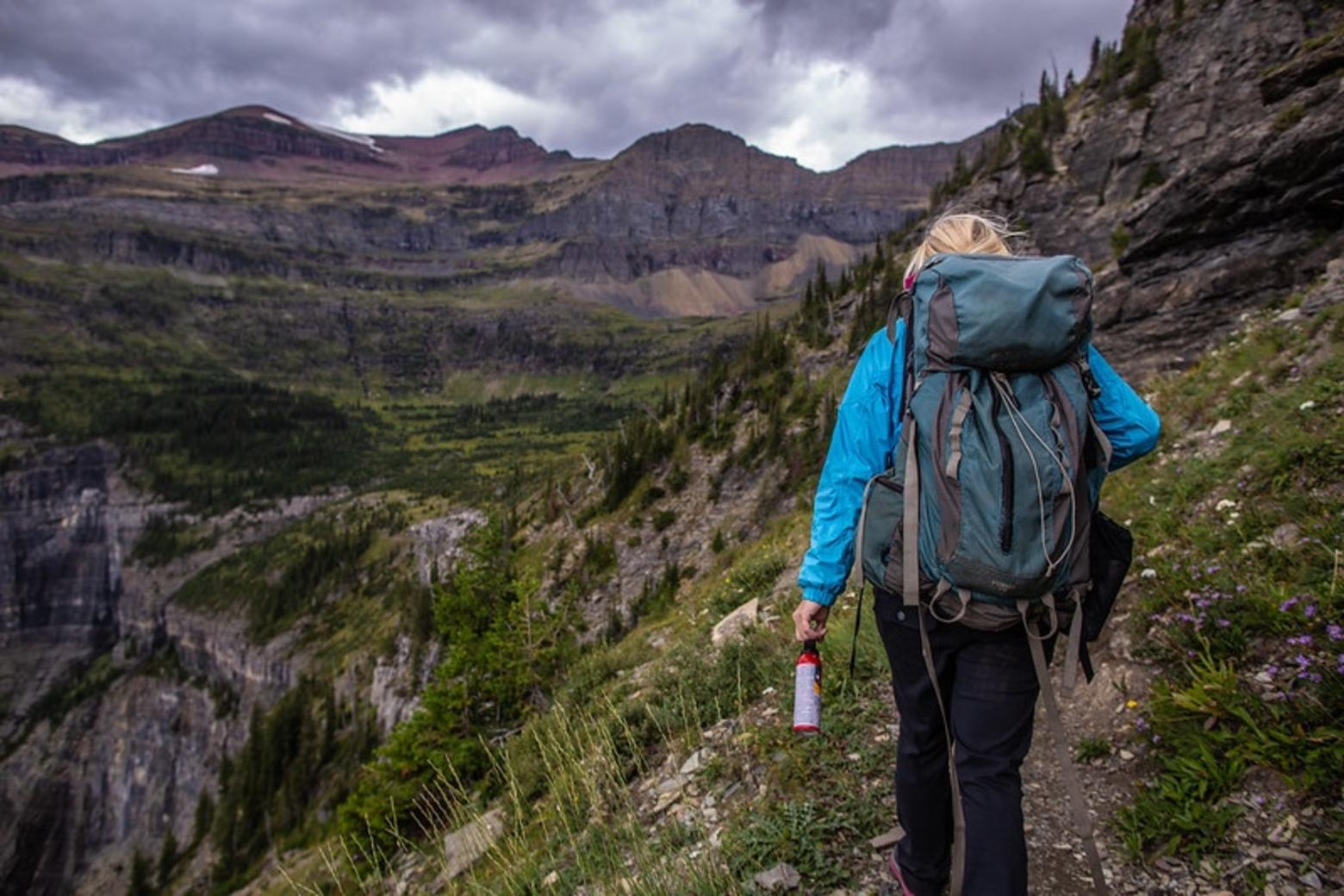A hiker in Glacier explores a backcountry trail in the Northern Rockies. Photo courtesy NPS