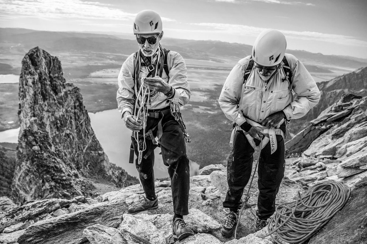 Rick Reese on top. A few years ago, Black Diamond shared this photo of Reese along with the caption and using it as an opportunity to praise him for his conservation work, including working to protect fragile geological formations in his native Utah. This photo, however, was taken in the Tetons.  Wrote Black Diamond: "Local Badass. Climbing Legend. Supporter of conservation Rick Reese (then 73 years old) gears up with Steve Moore for the CMC route on Mount Moran in Grand Teton National Park. In 1976, Rick was referred as the team's strongest climber for the Jenny Lake Climbing Rangers and he's still getting after it." Photo courtesy Savannah Cummins