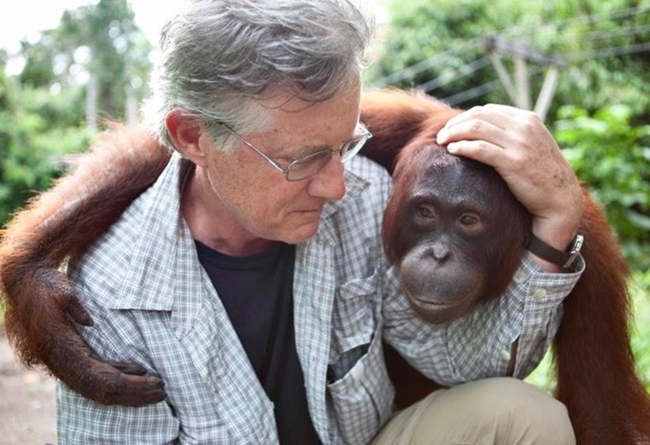 Two primates: conservationist William deBuys and a friend he met in Asia. Photo courtesy Bill deBuys