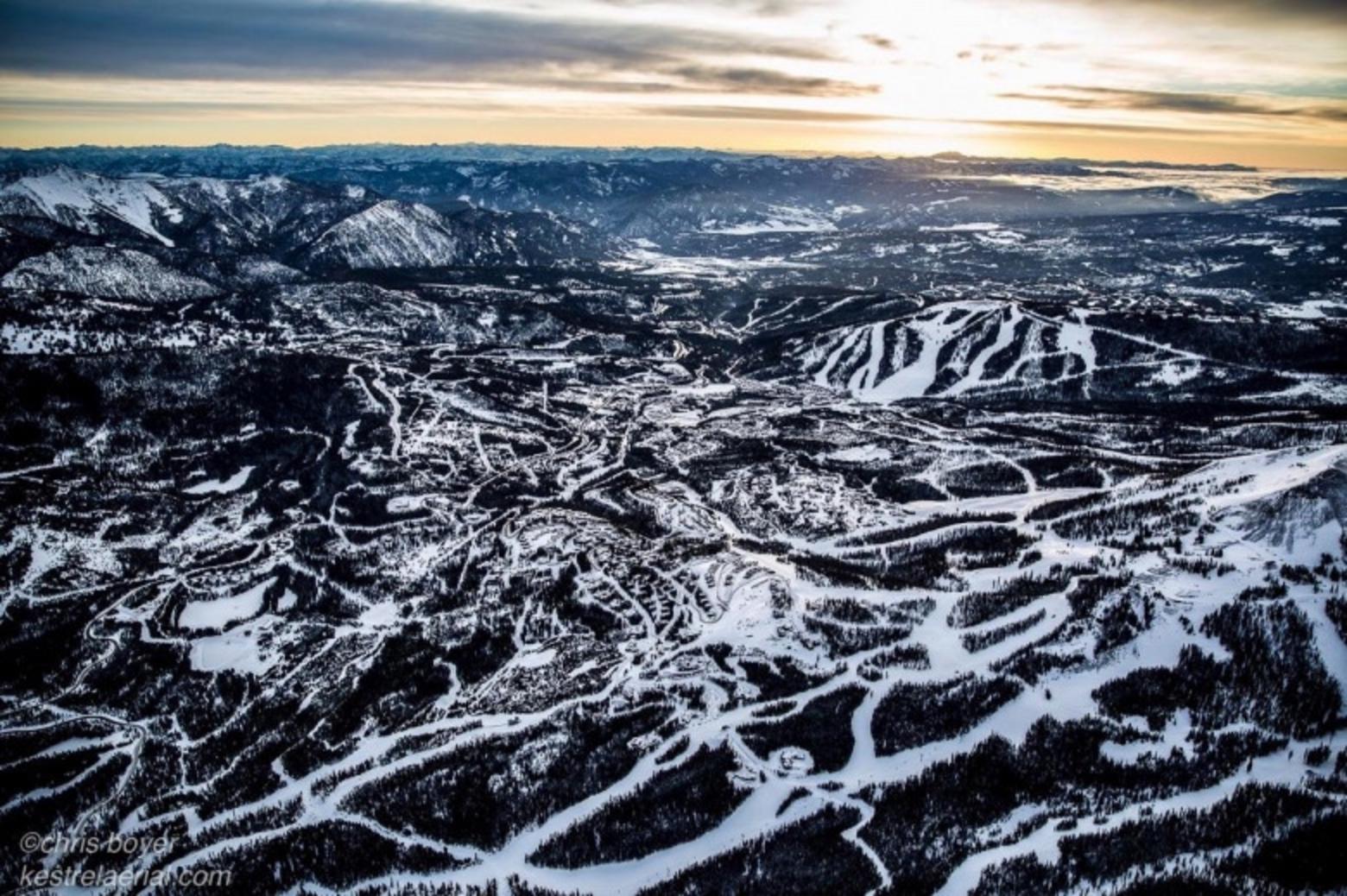 Once upon a time, this part of the Madison Range where Big Sky, Montana is now located was rich with wildlife and part of important migration corridors. Today, the impacts of ski slopes (which are also used by recreationists in warm weather seasons) and imprint of development are visible in this photography by Chris Boyer.  What kind of spillover effects is Big Sky having on wildlife in the Madison and Gallatin Range?  See more of Boyer's work at kestrelaerial.com