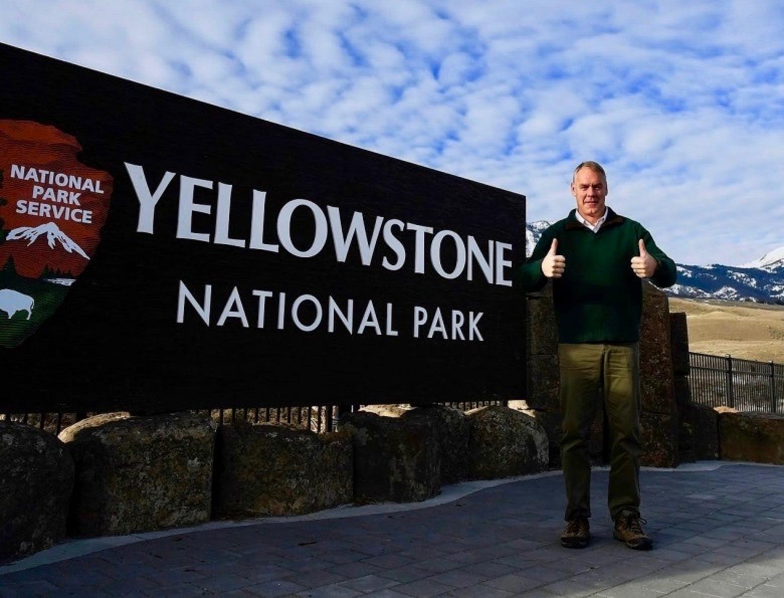 Ryan Zinke, during his recent short tenure as Interior Secretary, standing at the front gate of Yellowstone. Zinke believes limiting visitor numbers to Yellowstone is anathema. Instead, he wants to continue further turbo-charging recreation tourism by expanding the size of facilities, building more trails and infrastructure to accommodate more people not only in parks but on all public lands. Today, Zinke's desire to intensively enlarge the footprint of outdoor recreation is shared by the Biden Administration, members of the outdoor recreation industry he was previously at odds with and even conservation organizations. Photo courtesy NPS