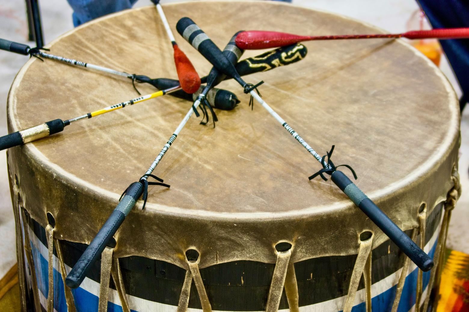 The sun dance is one of the most sacred ceremonies for tribal communities in the high plains of the US and Canada. For some it is about healing or righting one's way in the journey of life or, for teenagers, coming of age. Often, drums are used. Lois Red Elk references the sun dance in her poems below. Out of respect for the sun dance and those who participate in it, we are not sharing detailed photographs taken at ceremonies or paintings made by artists.  This image of a drum, taken at a pow wow, is courtesy Shutterstock 130073903/James Mattil 