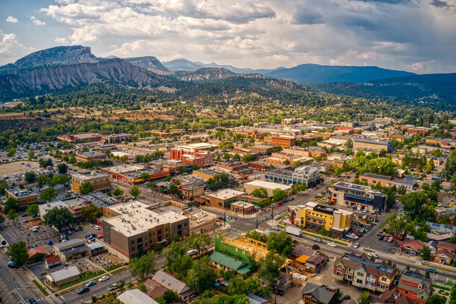 Durango is typical of a lot of mountain towns where people with means and leisure time want to be. But what happens to community when only the rich can afford to live there? It's a question affecting towns in Greater Yellowstone, too.  Aerial photo of Durango by Jacob Boomsma/Shutterstock ID 1853645695